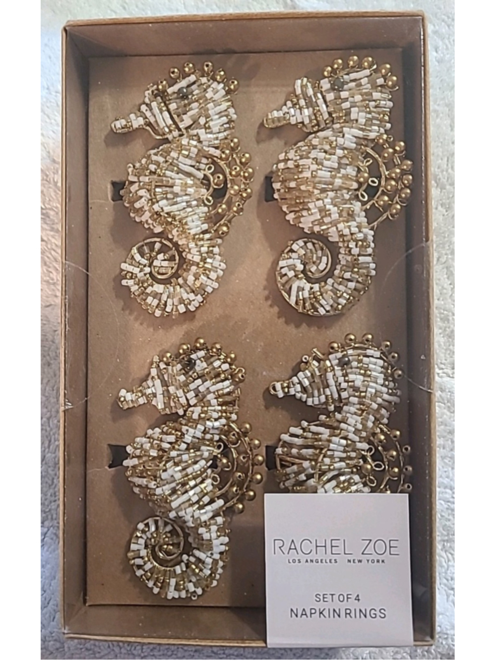 New In Box Seahorse Napkin Rings by Rachel Zoe Set of 4 White Gold Coastal
